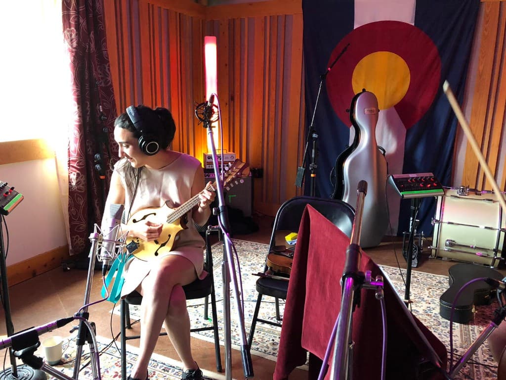 Sarah recording mandolin in the studio